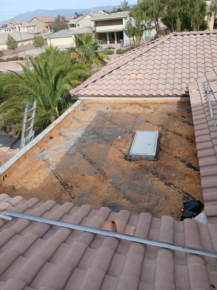 Slide of Danny's Roofing Service