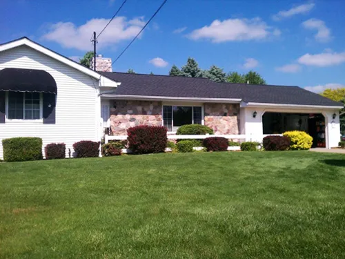 Slide of Dan's Roofing