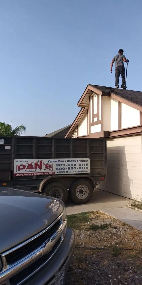 Slide of Dan's Roofing