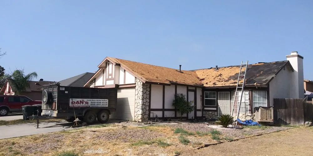 Slide of Dan's Roofing