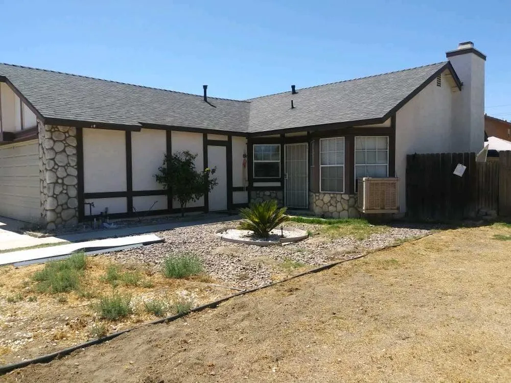 Slide of Dan's Roofing