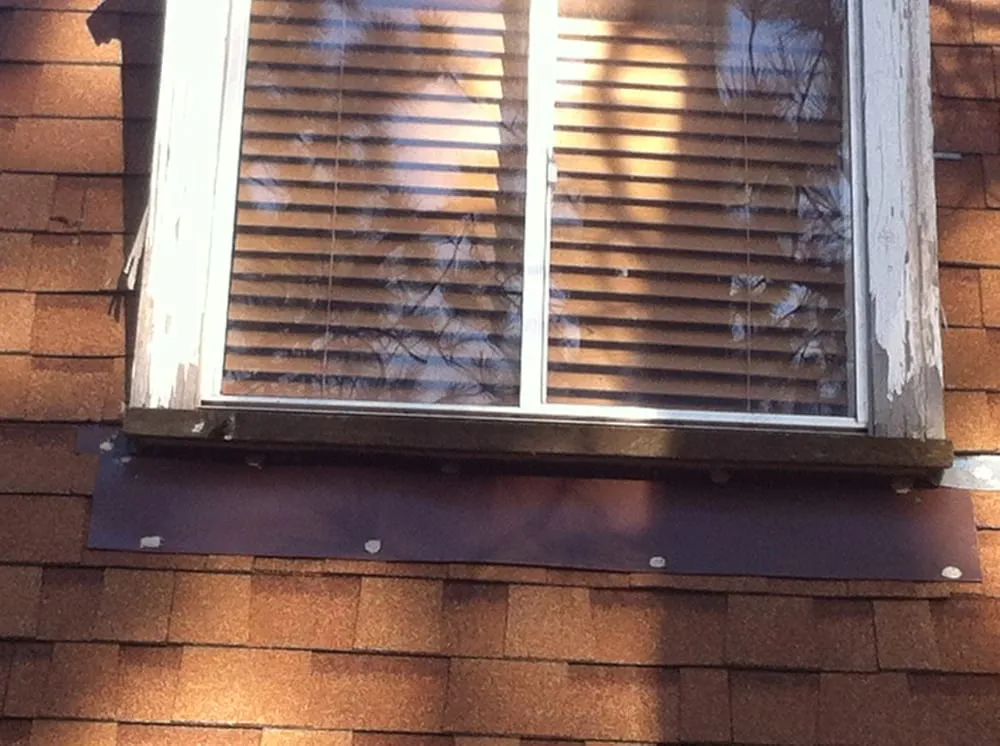 Slide of Dan's Roofing