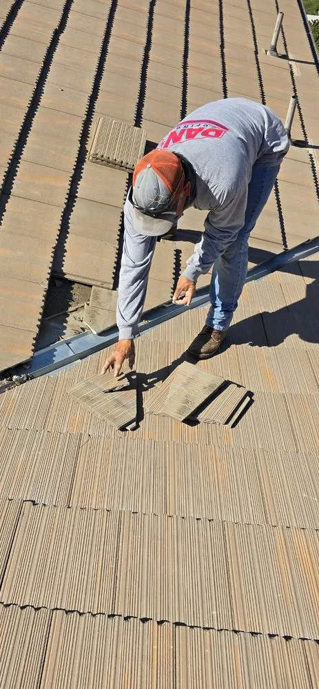 Slide of Dan's Roofing