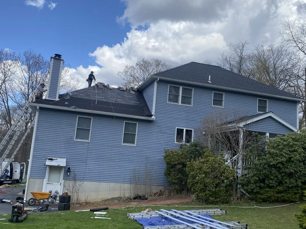 Slide of Danvers Roofing