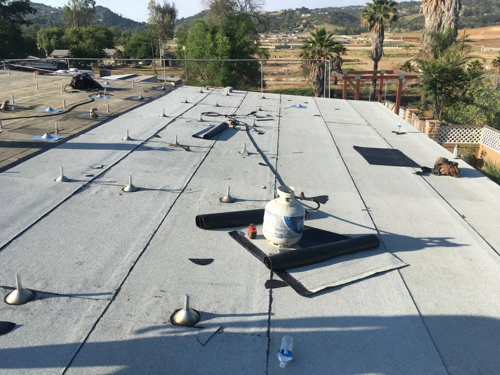 Slide of Davalos Roofing