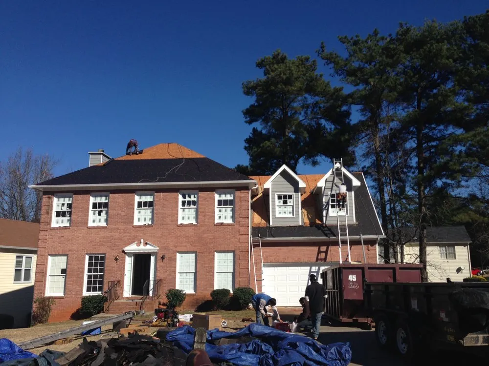 Slide of Dave Clark Roofing