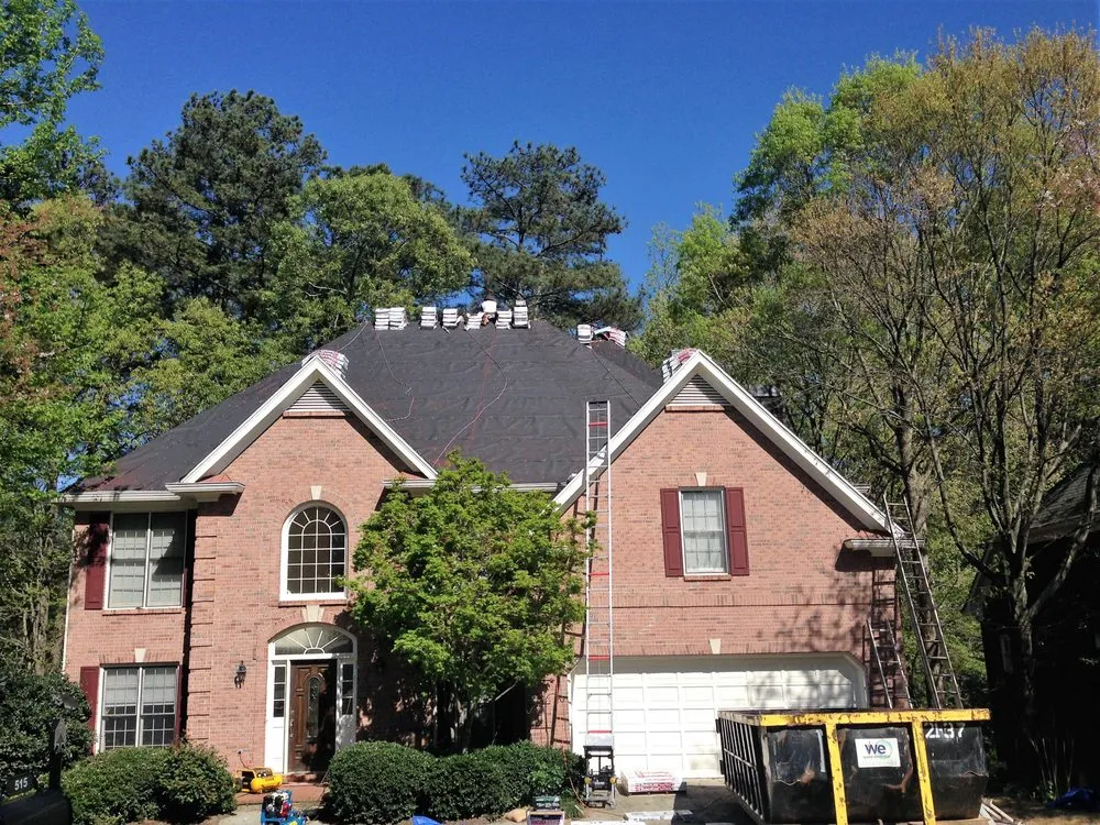 Slide of Dave Clark Roofing