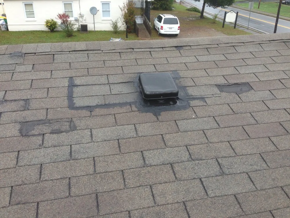 Slide of Dave Clark Roofing