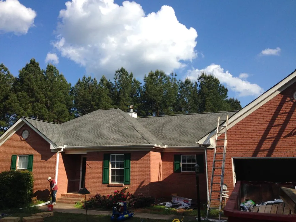 Slide of Dave Clark Roofing