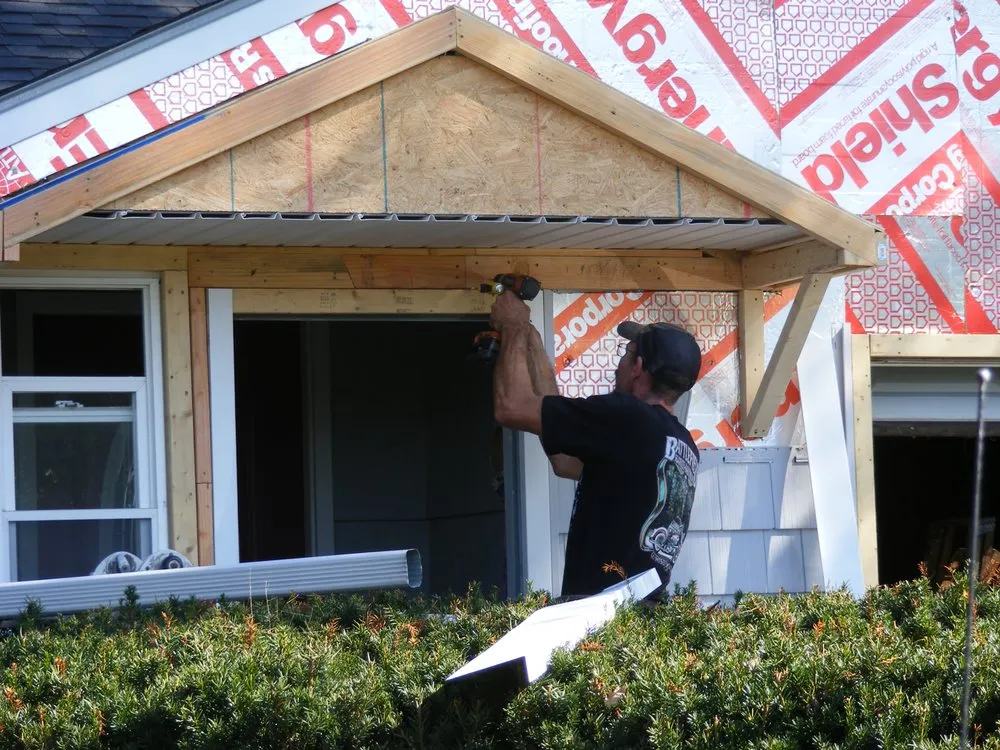 Licensed shingle roofing service after storm damage in Belvidere Center, VT by Dave Koss Home Improvements