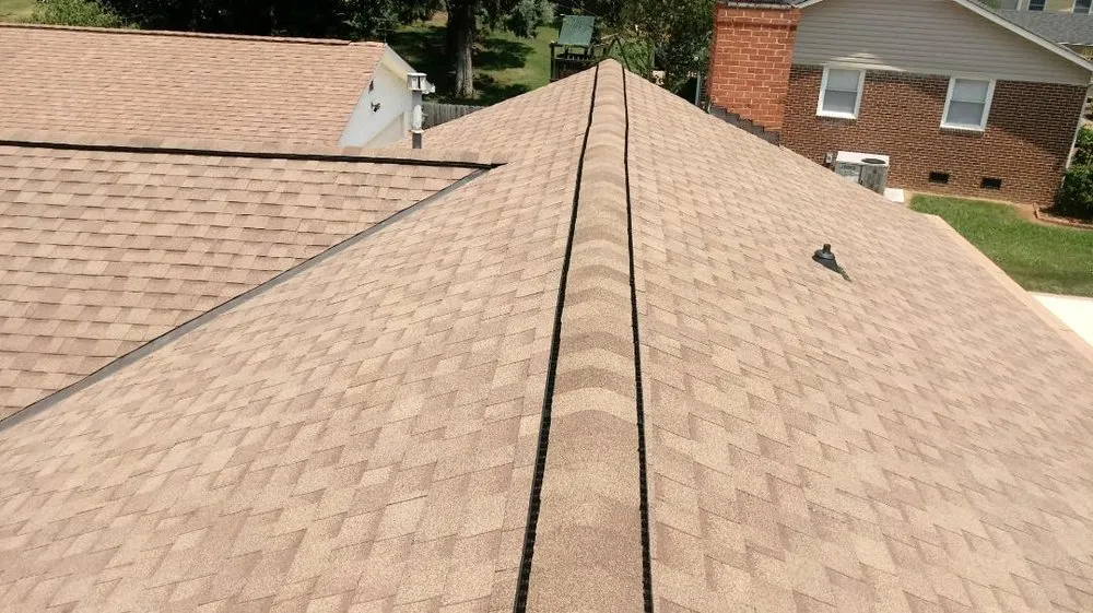 Slide of Dave Powers Roofing Group