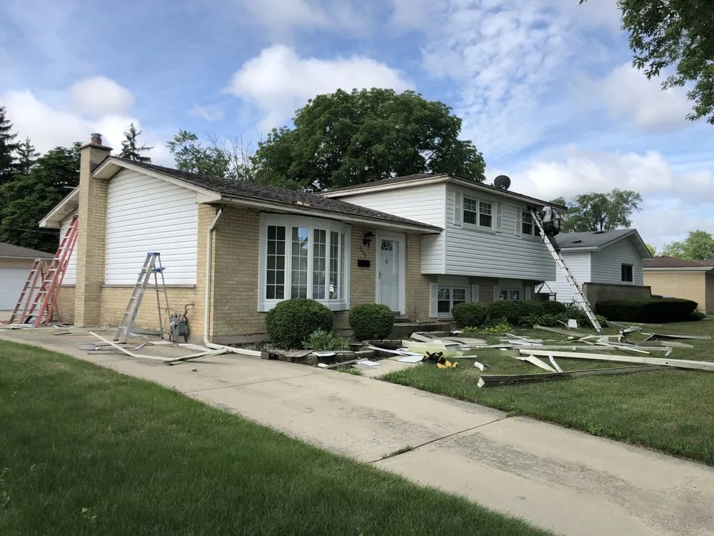 Slide of Dave's Roofing - Tuckpointing - Windows