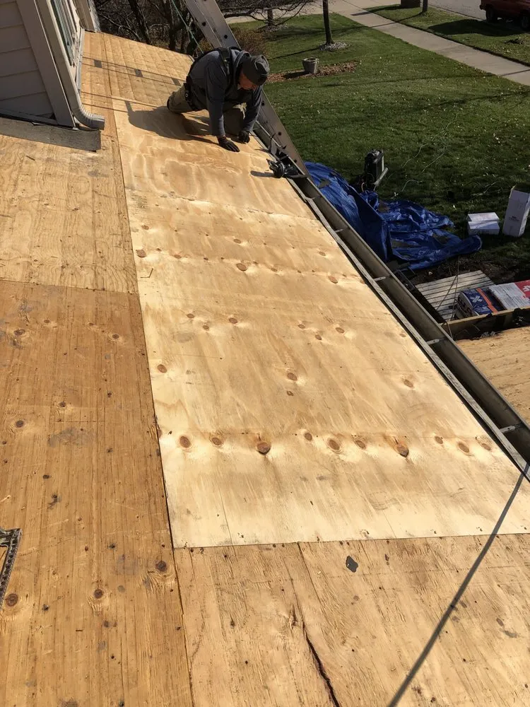 Slide of Dave's Roofing - Tuckpointing - Windows