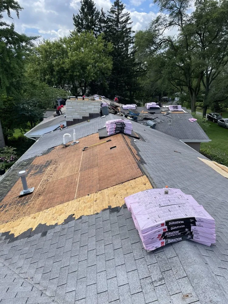 Slide of Dave's Roofing - Tuckpointing - Windows