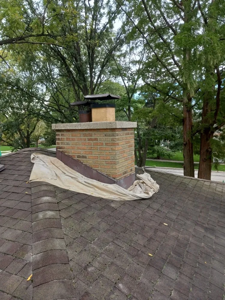 Slide of Dave's Roofing - Tuckpointing - Windows