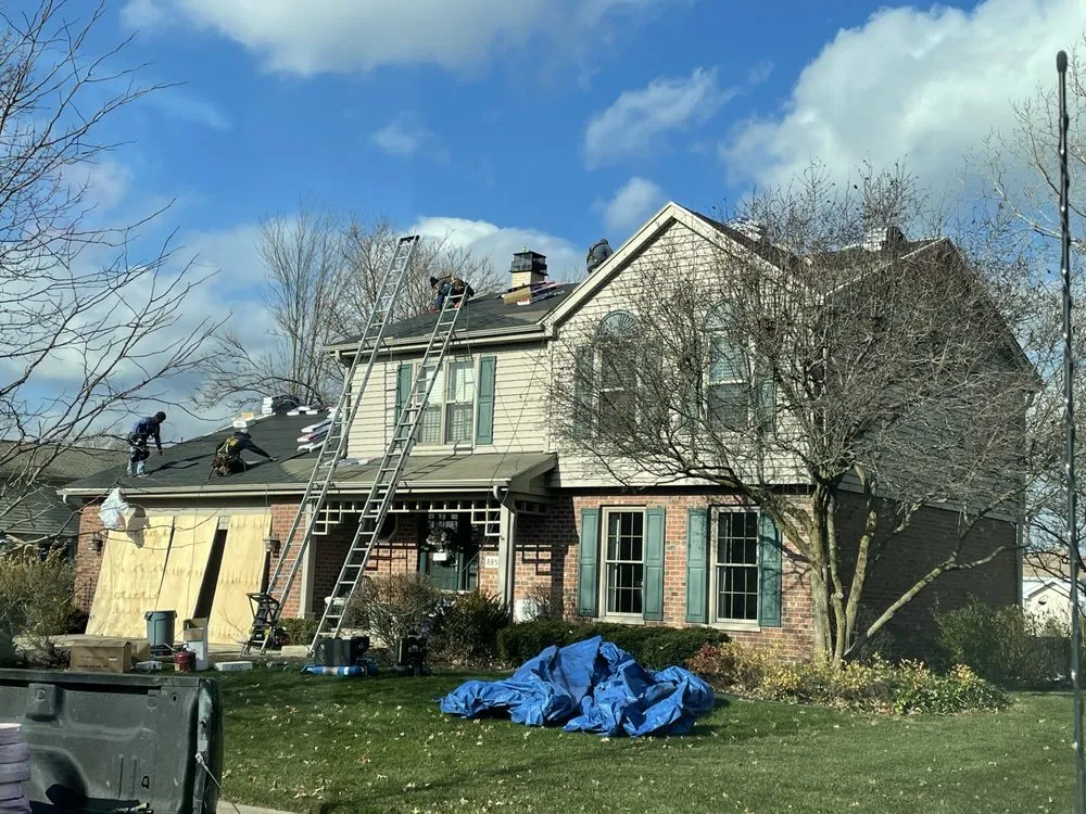 Slide of Dave's Roofing - Tuckpointing - Windows