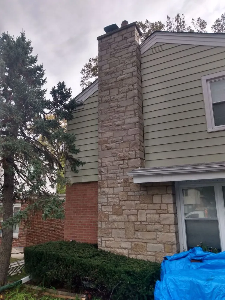 Slide of Dave's Roofing - Tuckpointing - Windows