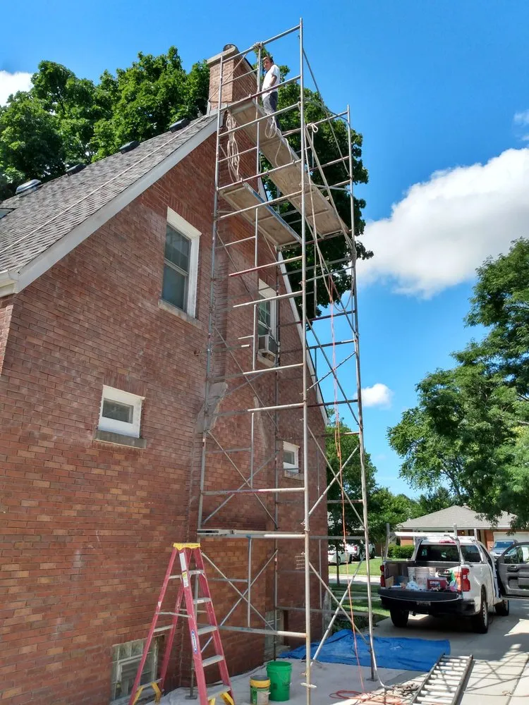 Slide of Dave's Roofing - Tuckpointing - Windows
