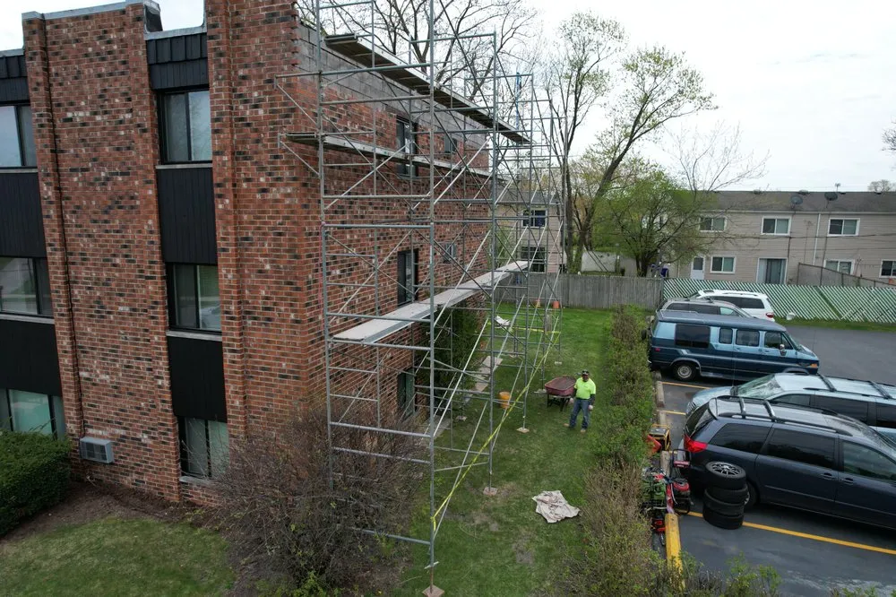 Slide of Dave's Roofing - Tuckpointing - Windows