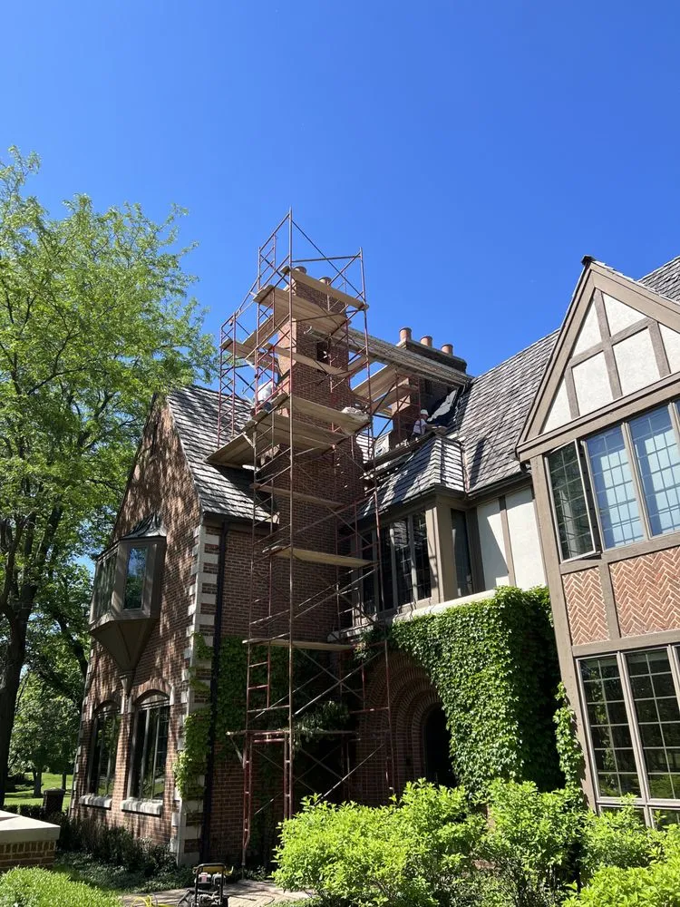 Slide of Dave's Roofing - Tuckpointing - Windows