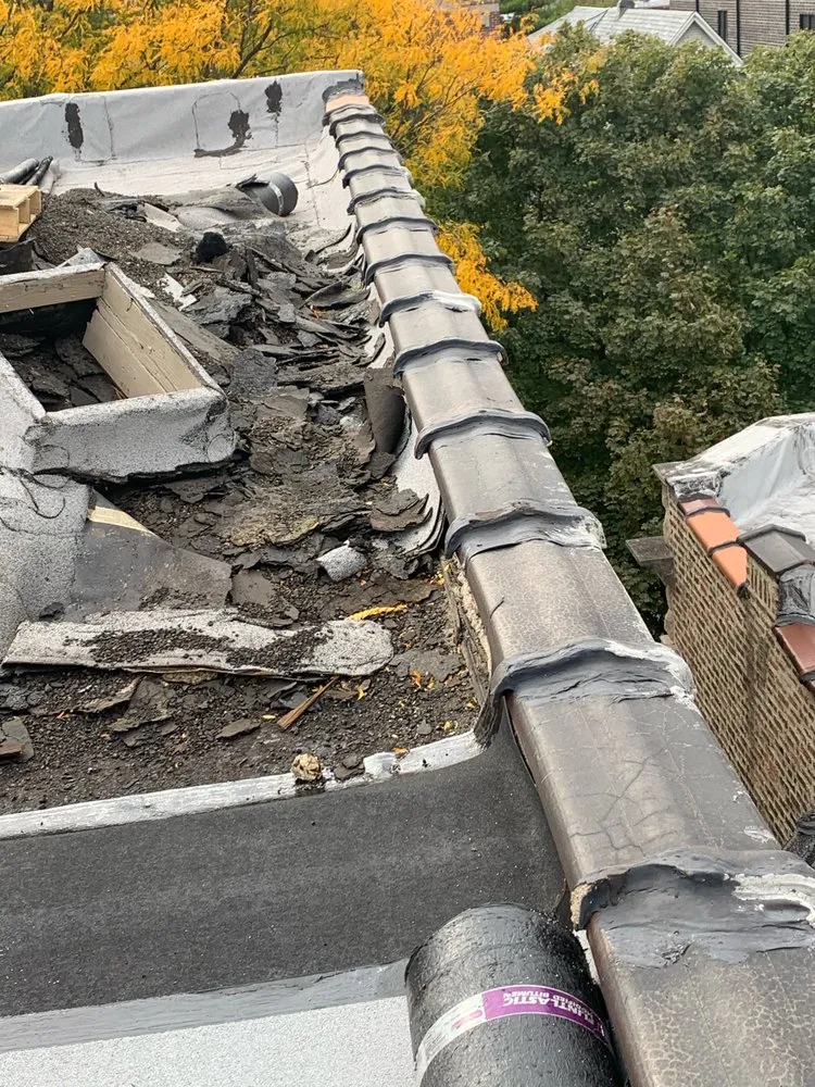 Slide of Dave's Roofing - Tuckpointing - Windows