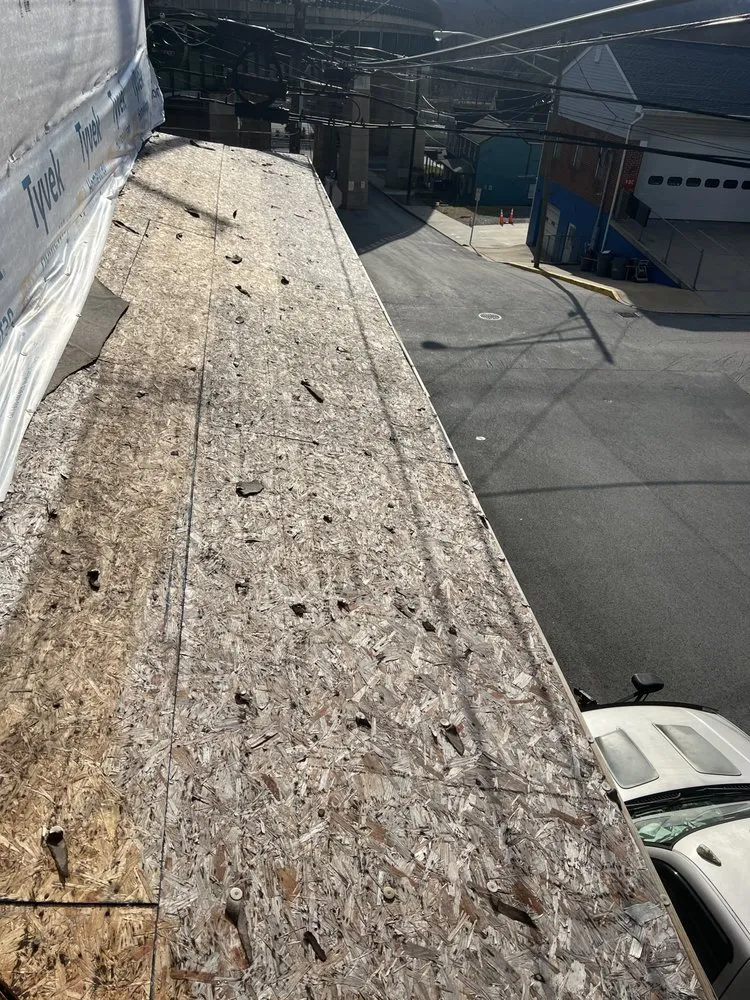 Slide of Dave's Roofing and Construction