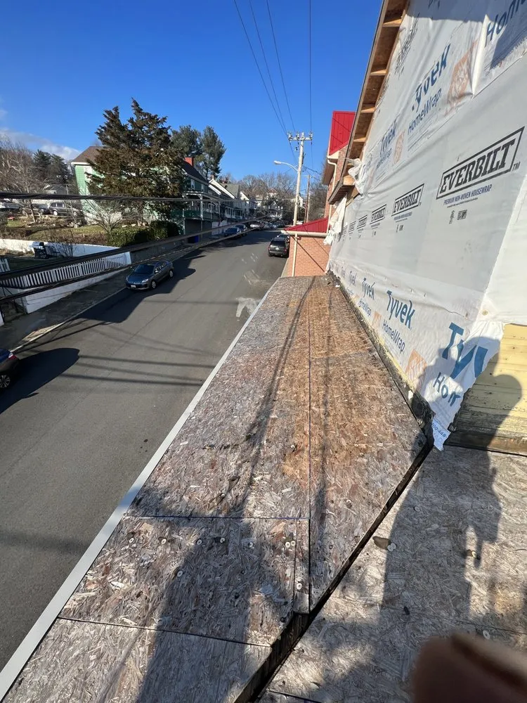 Slide of Dave's Roofing and Construction