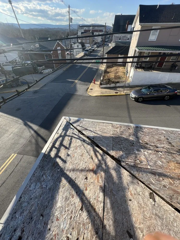 Slide of Dave's Roofing and Construction