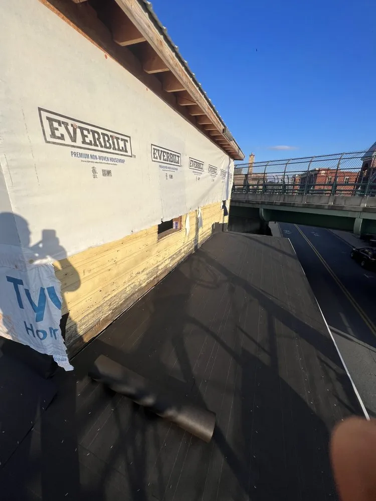 Slide of Dave's Roofing and Construction