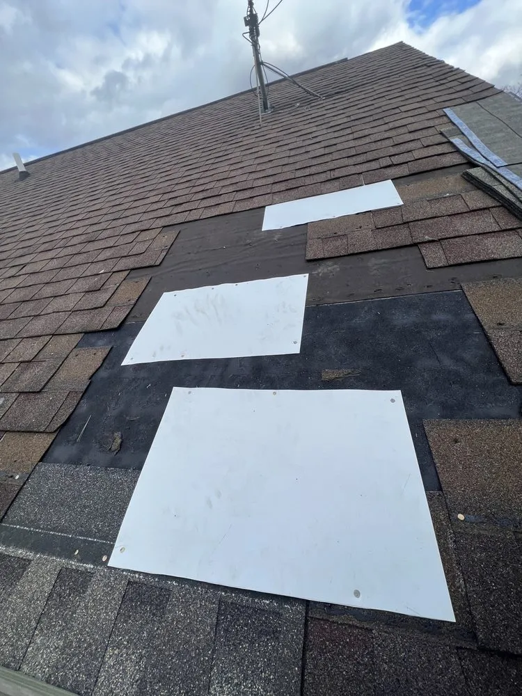 Slide of Dave's Roofing and Construction