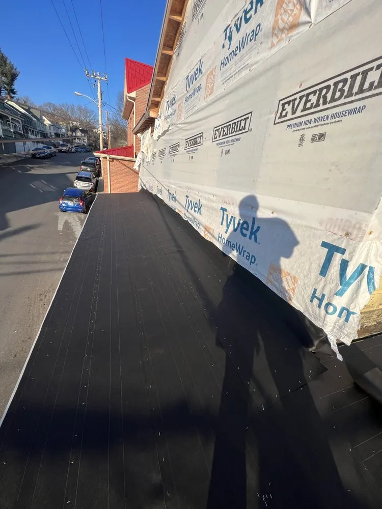 Slide of Dave's Roofing and Construction