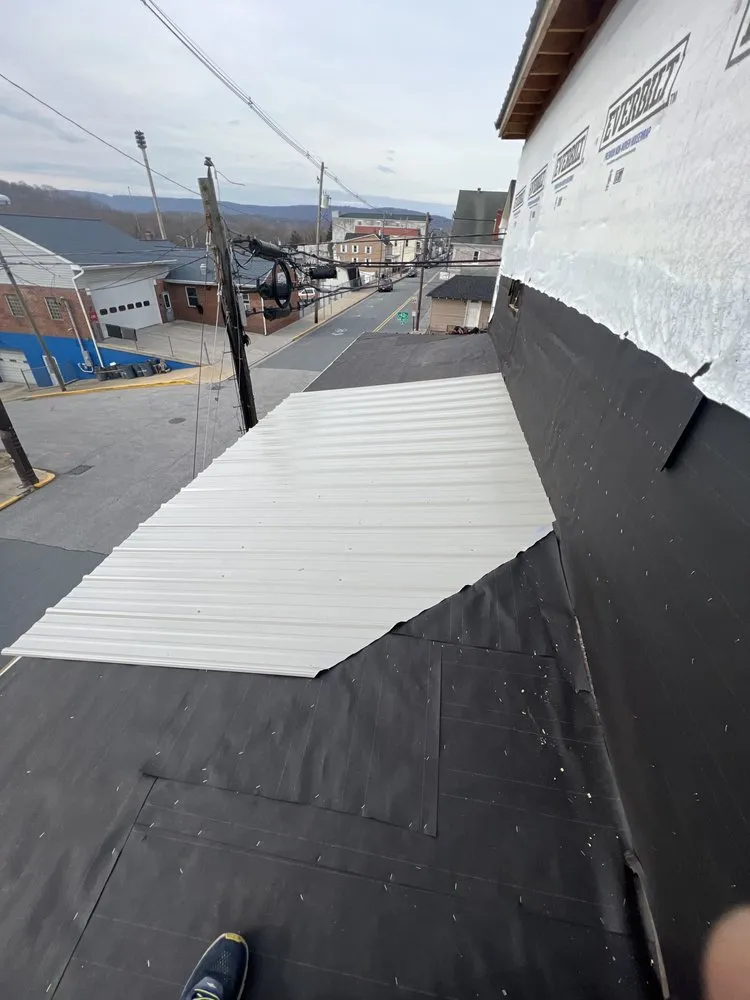 Slide of Dave's Roofing and Construction