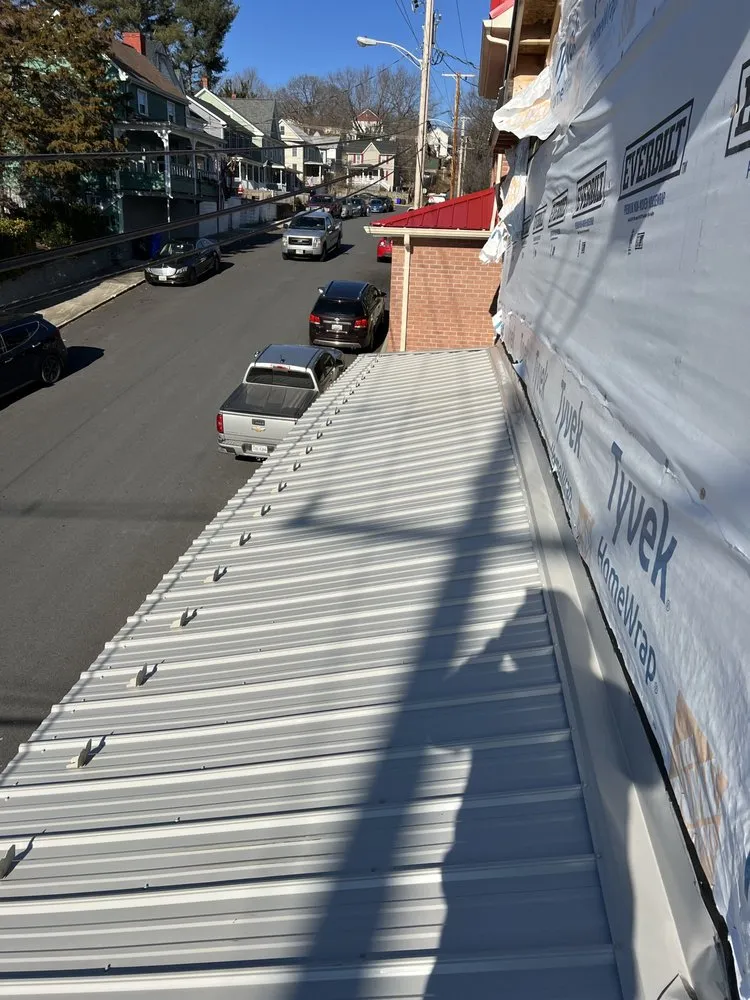 Slide of Dave's Roofing and Construction