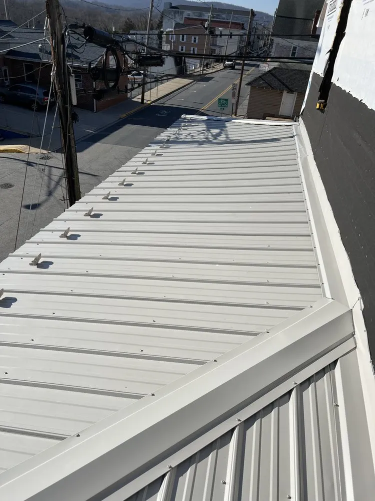 Slide of Dave's Roofing and Construction