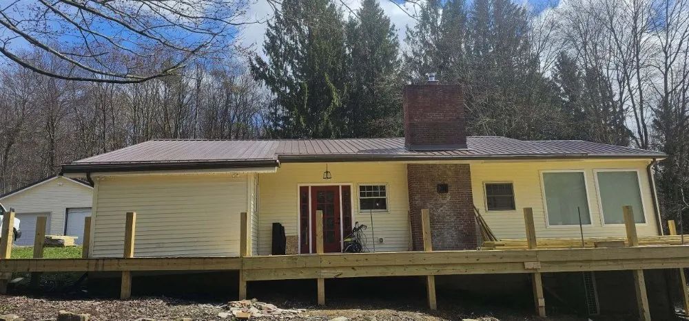 Slide of Daves Seamless Gutters & Contracting