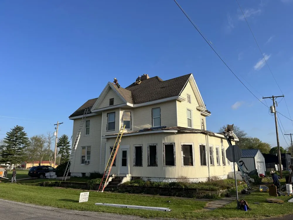 Emergency shingle roofing service for residential properties in West Salem, IL by David Brown Construction