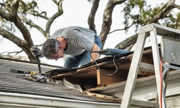 Slide of David's Roofing and Gutters