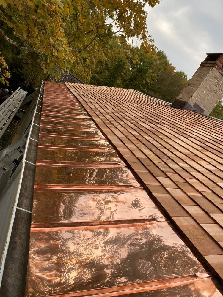 Slide of David's Roofing and Restorations