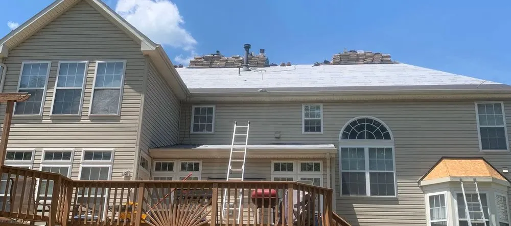 Slide of Days Worth Roofing