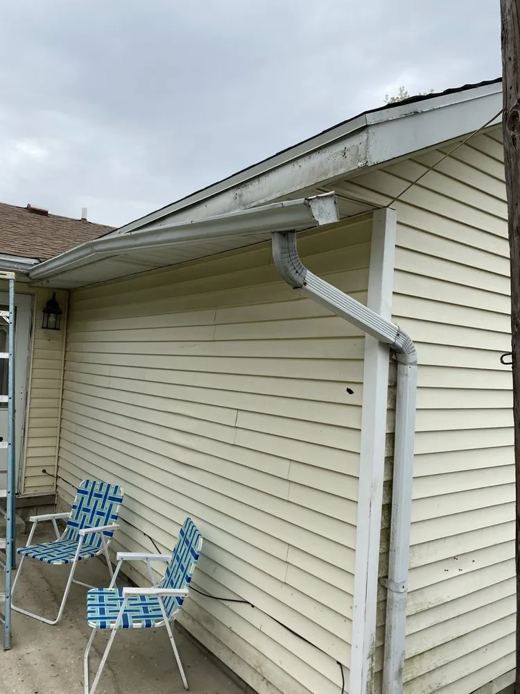 Slide of Dayton spouting & siding