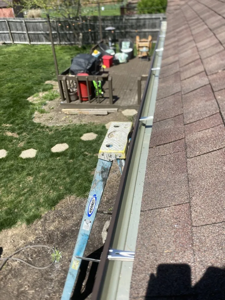 Slide of Dayton spouting & siding