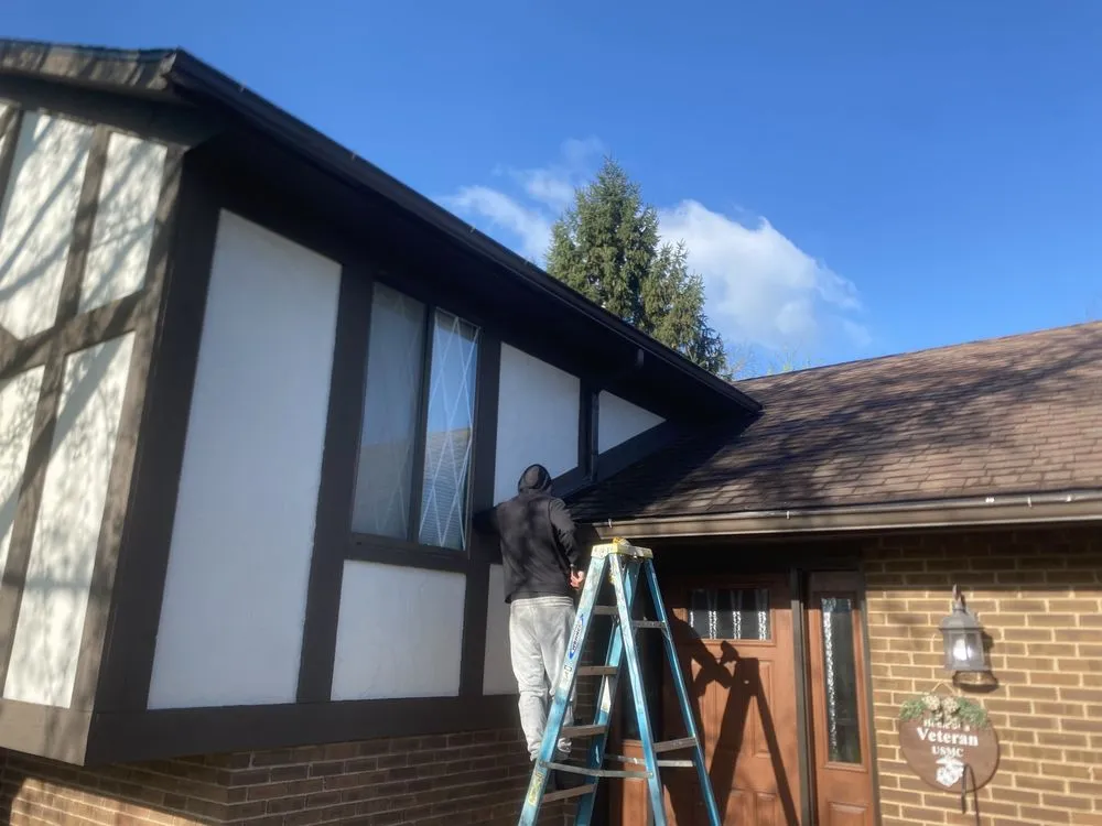 Slide of Dayton spouting & siding