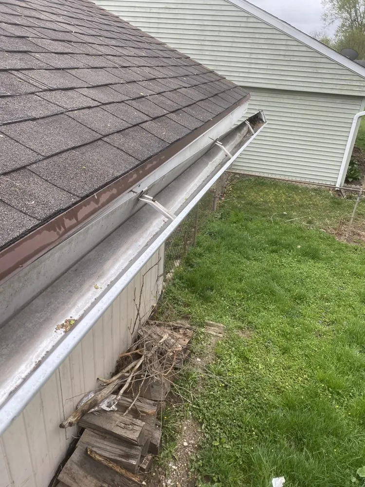 Slide of Dayton spouting & siding