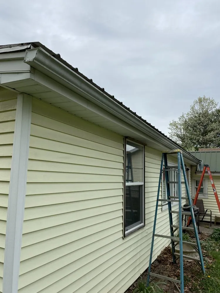 Slide of Dayton spouting & siding