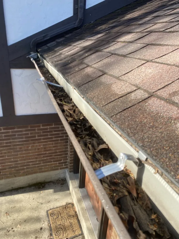 Slide of Dayton spouting & siding