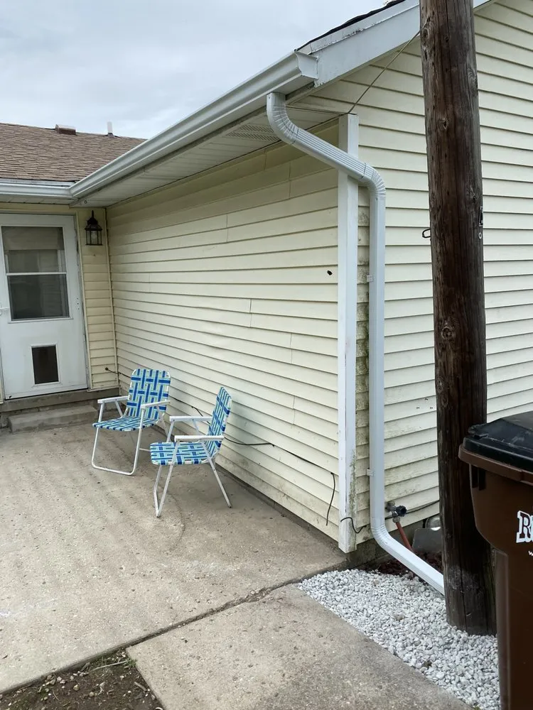 Slide of Dayton spouting & siding