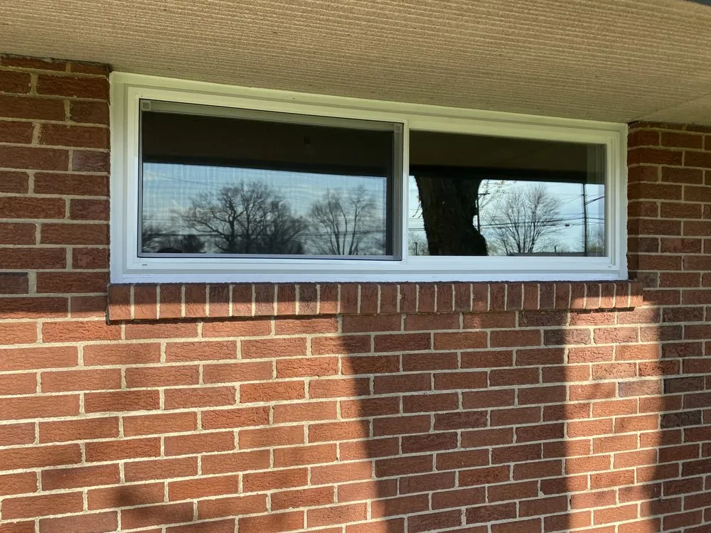 Slide of Dayton spouting & siding