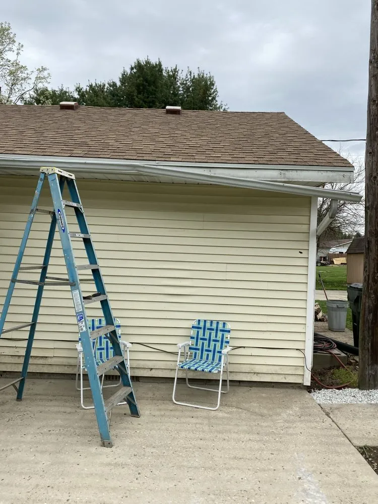 Slide of Dayton spouting & siding