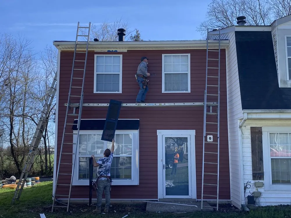 Slide of DC's Roofing and Contracting