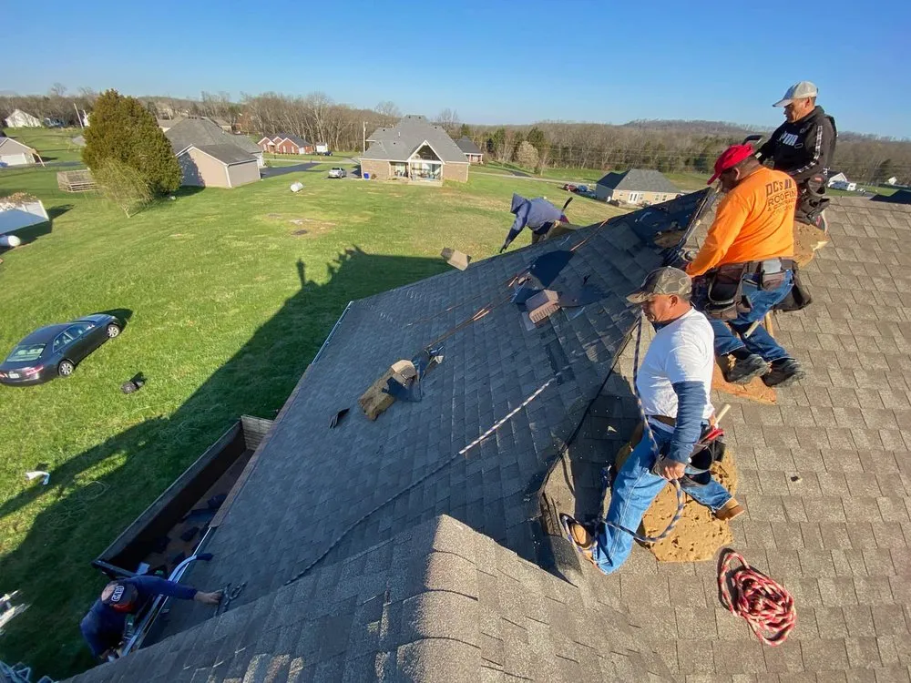 Slide of DC's Roofing and Contracting